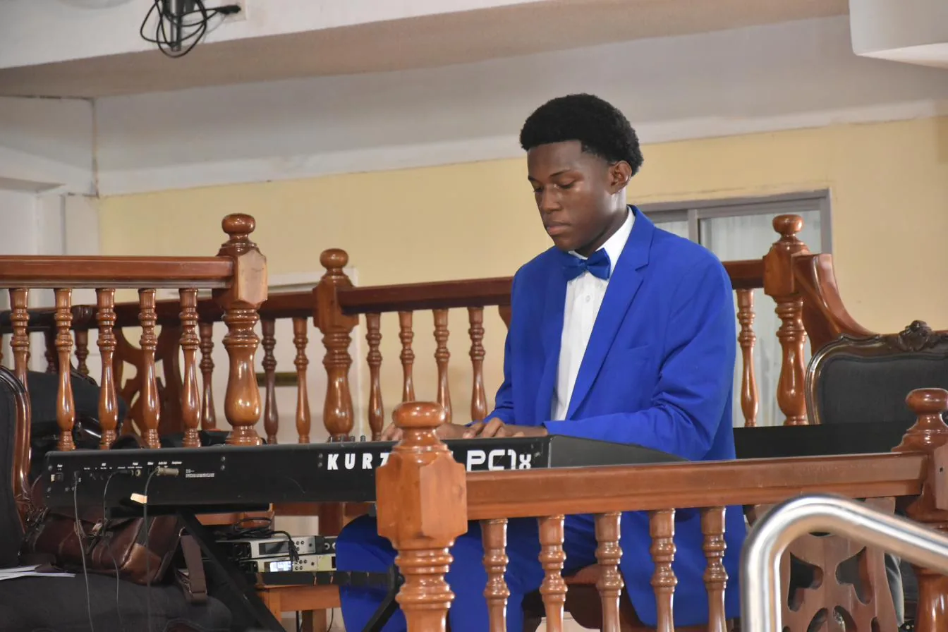 A musician accompanying the service on keyboard