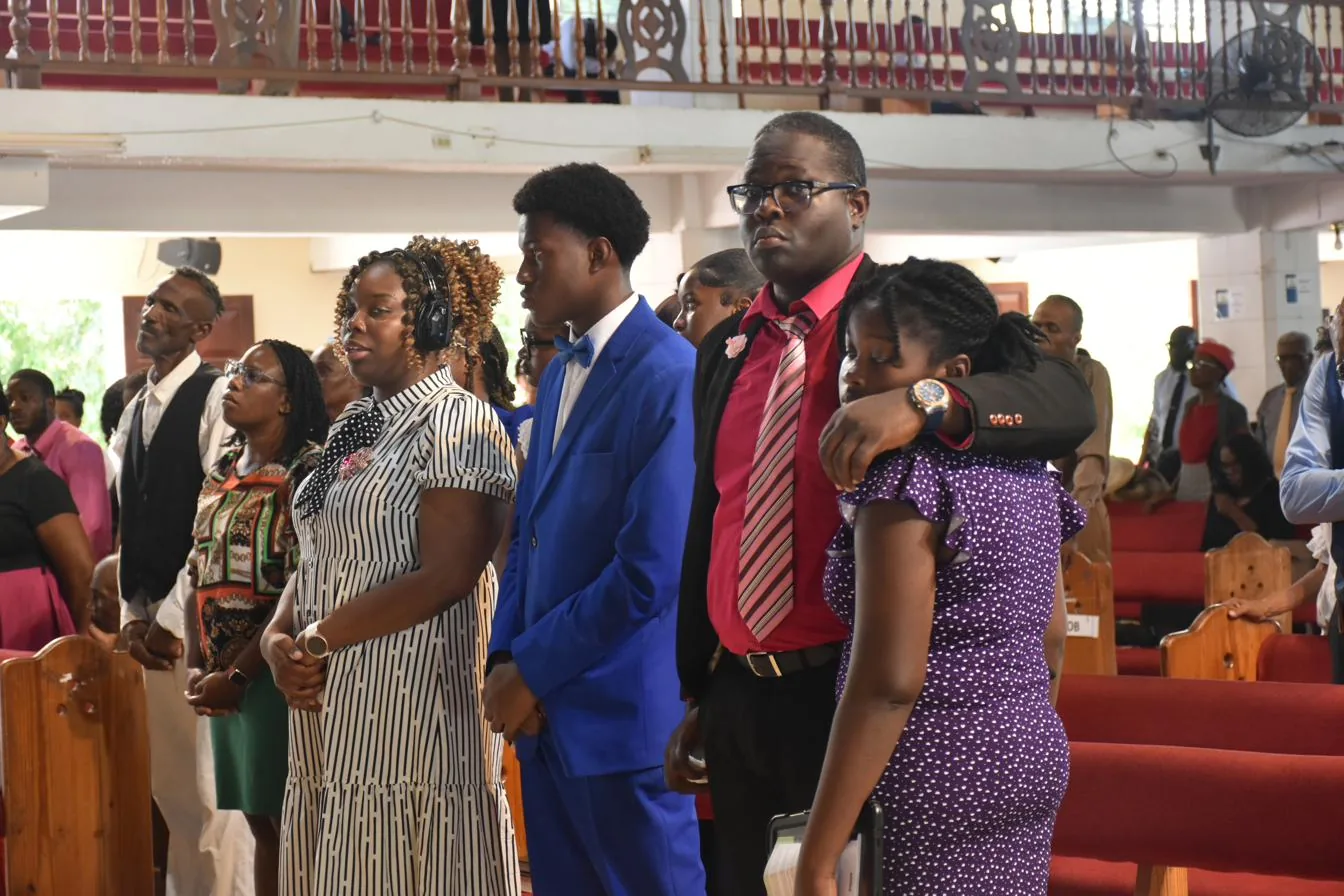 The congregation standing for the opening song